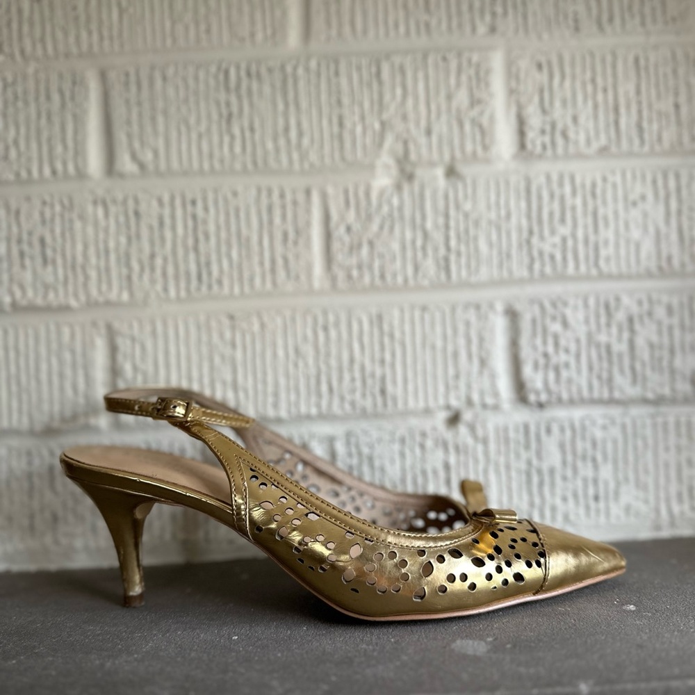 Gold kate spade heels with bows Used with wear, stunning heel! Size 7